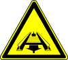 Warnung vor Gefahren durch eine Förderanlage im Gleis